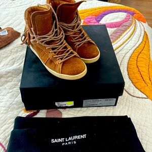 Auth Saint Laurent fall sneakers. Suede tabacco brown with fringe on the heel.